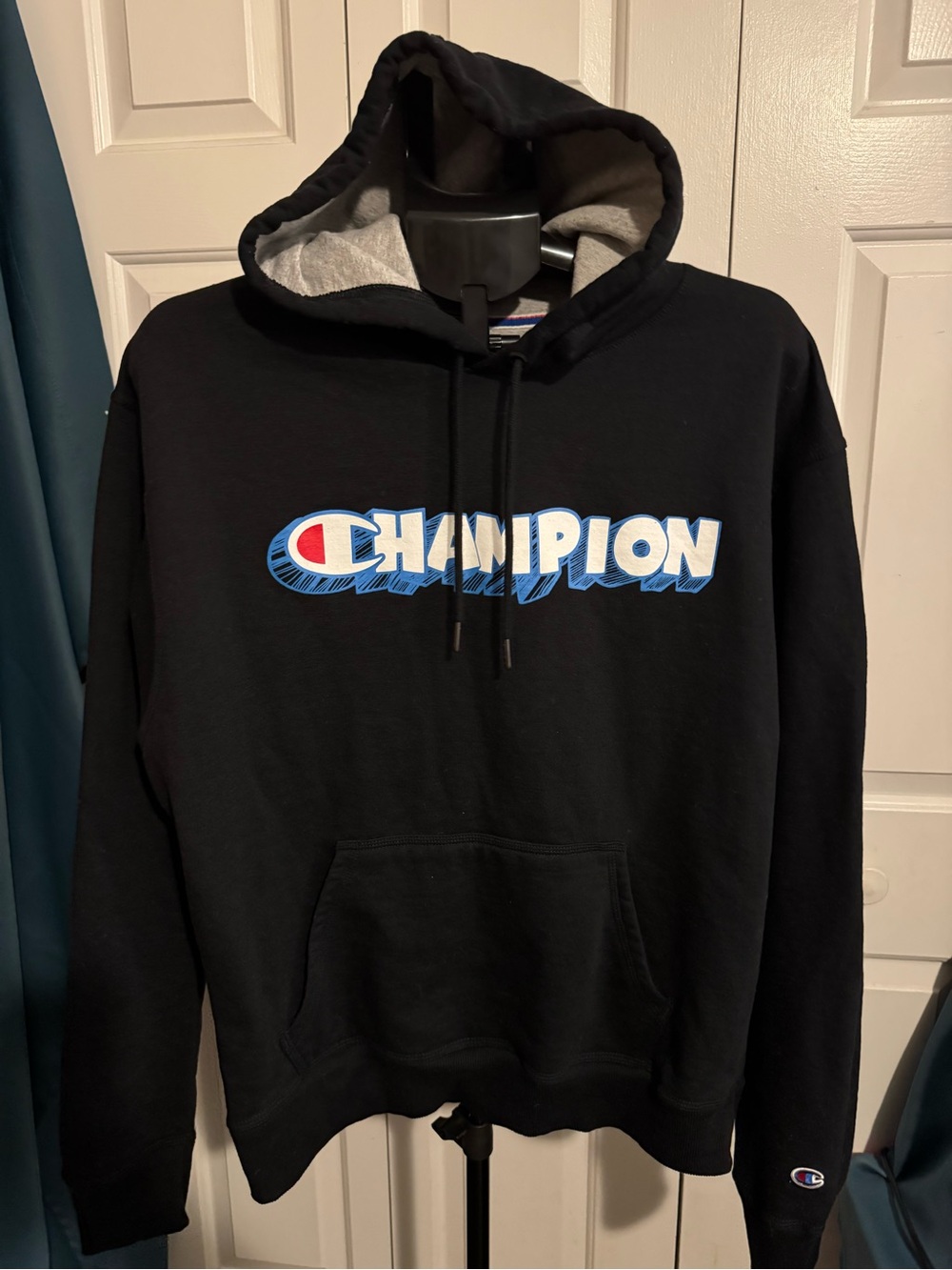 Champion Black Crewneck Hoodie with White and Blue Logo